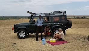 Land Rover Defender with Rooftop Pop-up 